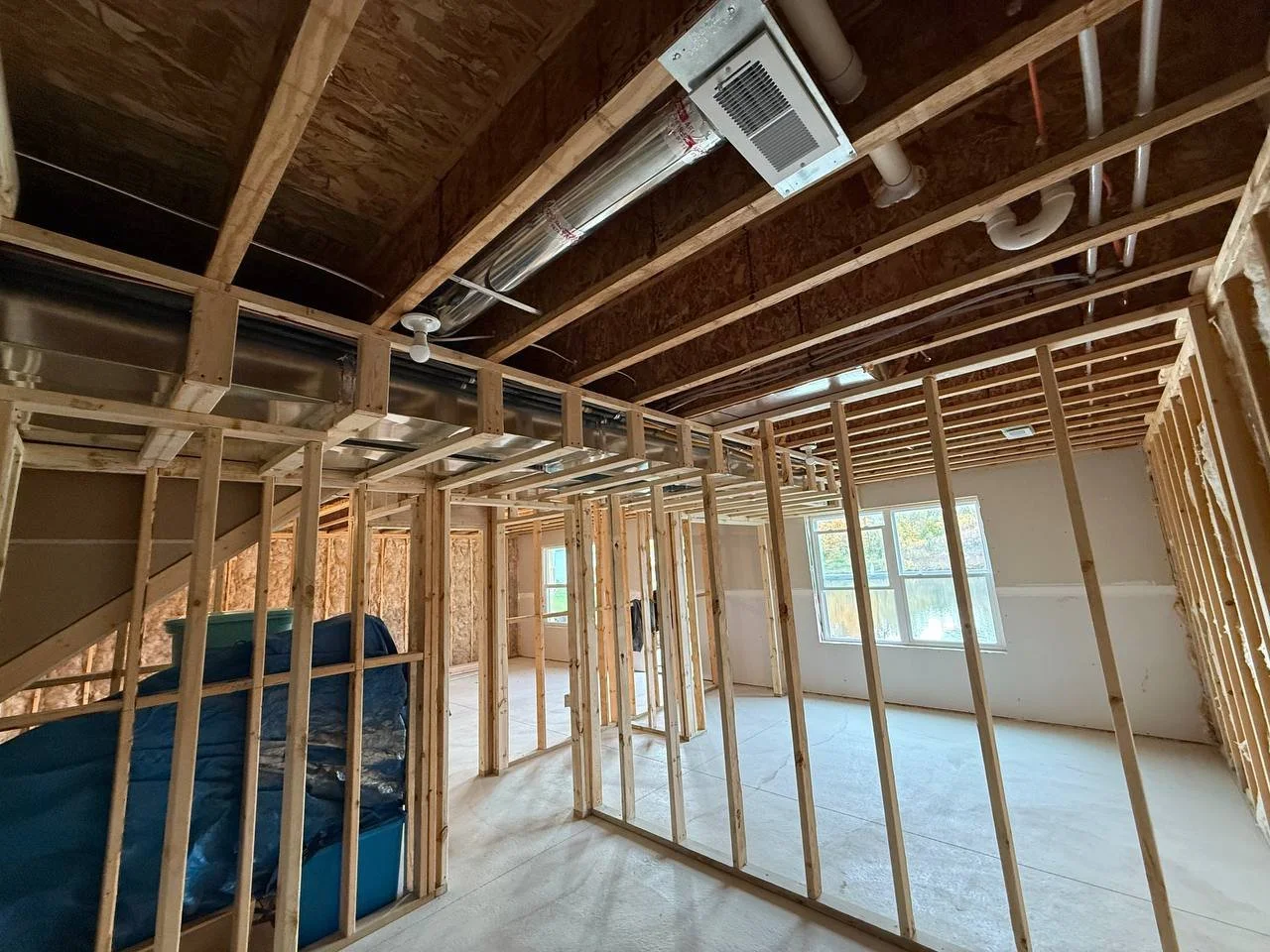 Basement finishing project by J & M Group Michigan in Greenville, MI