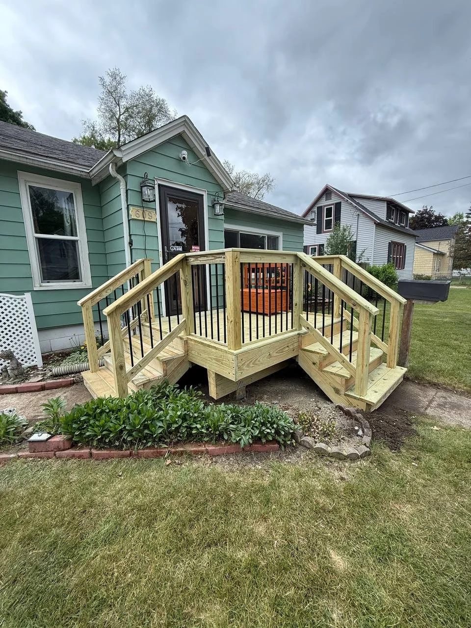 Custom deck project by J & M Group Michigan in Greenville, MI