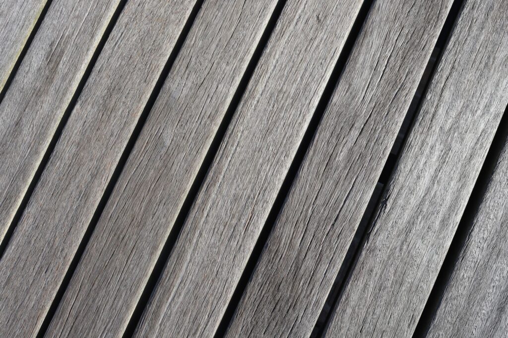 Close-up of weathered wooden planks showing unique grain and texture.